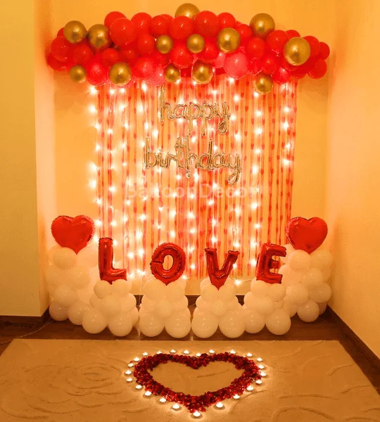 Romantic lights and rose petals anniversary decoration
