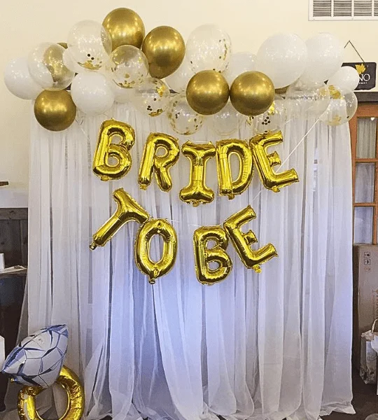 beautiful golden & white balloon decoration